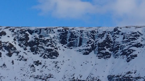 Ice covered mountain crag.